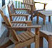 wooden chairs on a porch